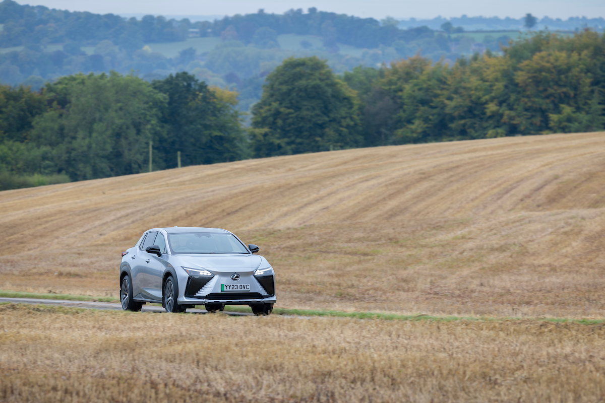 Lexus RZ450e driving in field