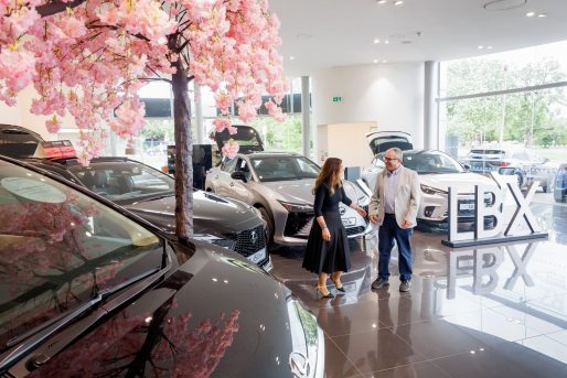 Lexus Woodford customer, Laurie Rosenberg, being greeted by Sales Director, Nahide Crisp.